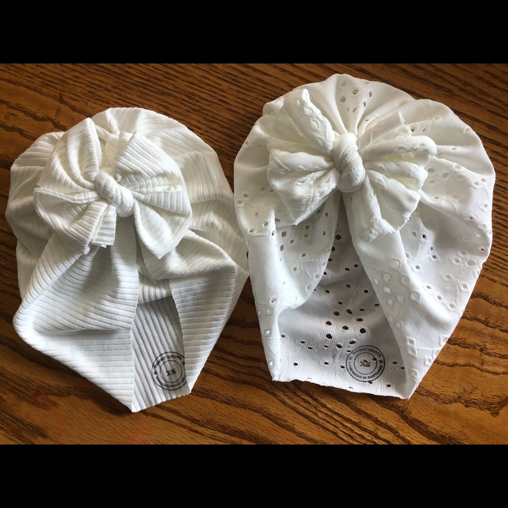 Two Bunny Knot baby turbans in white with bows